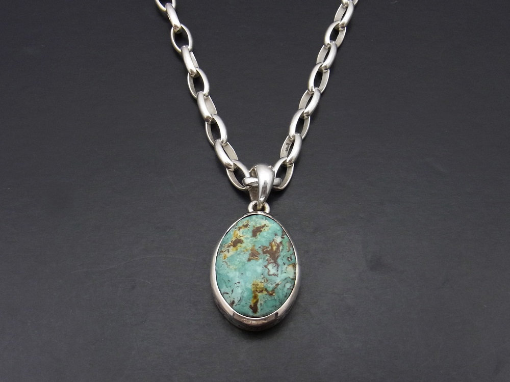 " Valhalla Collection " Carved Turquoise Pendant w/ Silver Plain " Valhalla Collection " Carved Turquoise Pendant w/ Silver Plain